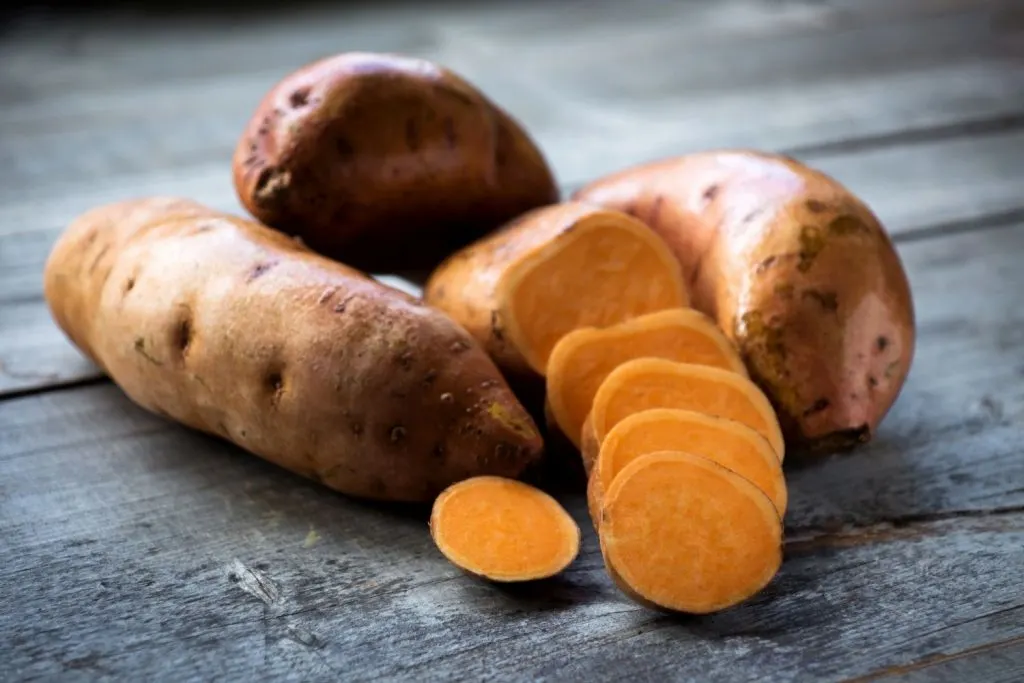 Sweet potatoes, some of them sliced