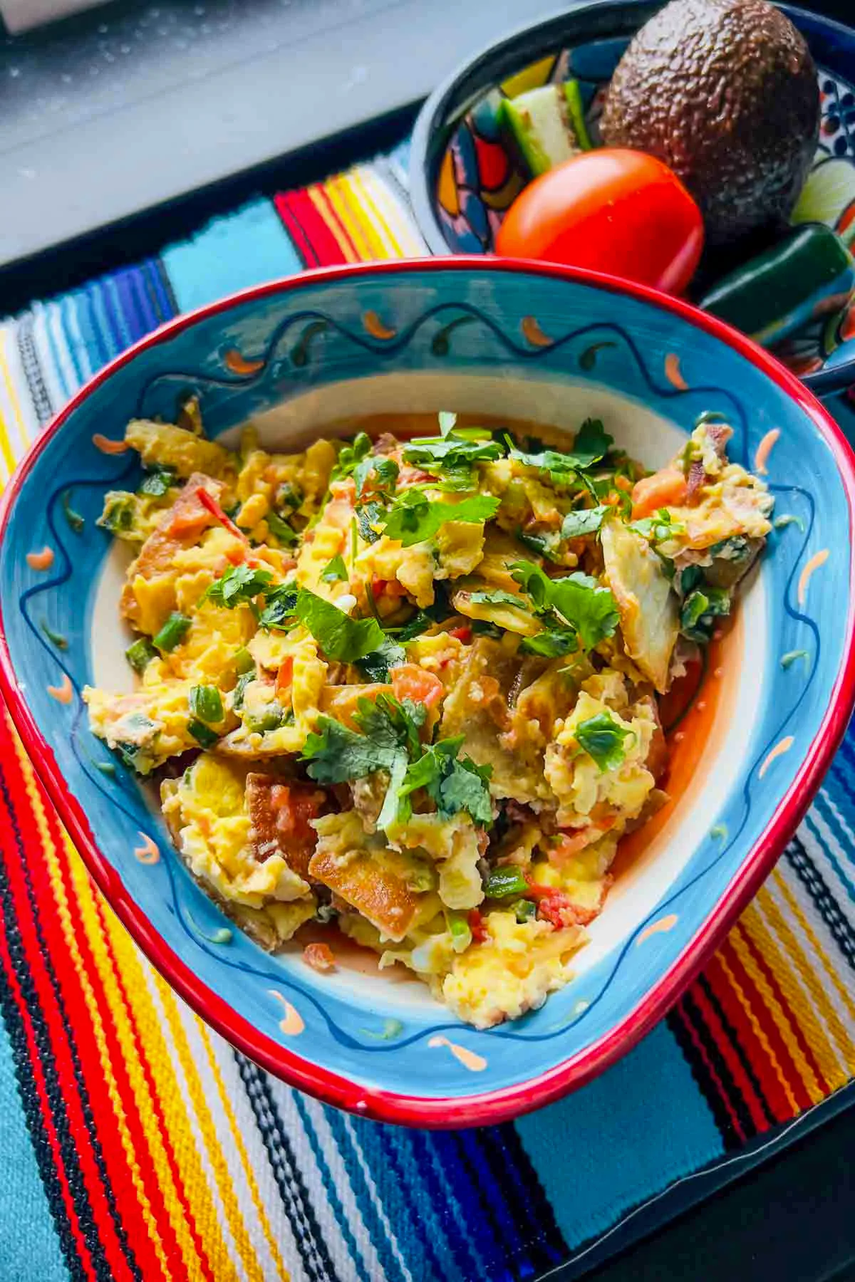 Migas Mexican Breakfast in a colorful bowl.