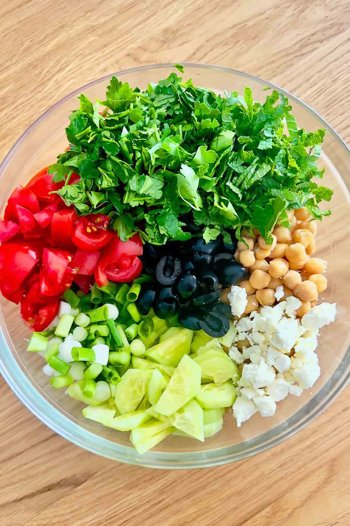 Chopped ingredients for the salad in a bowl.