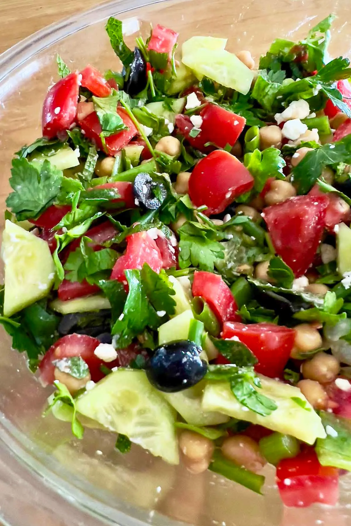 Greek Cucumber salad with chickpeas close up.