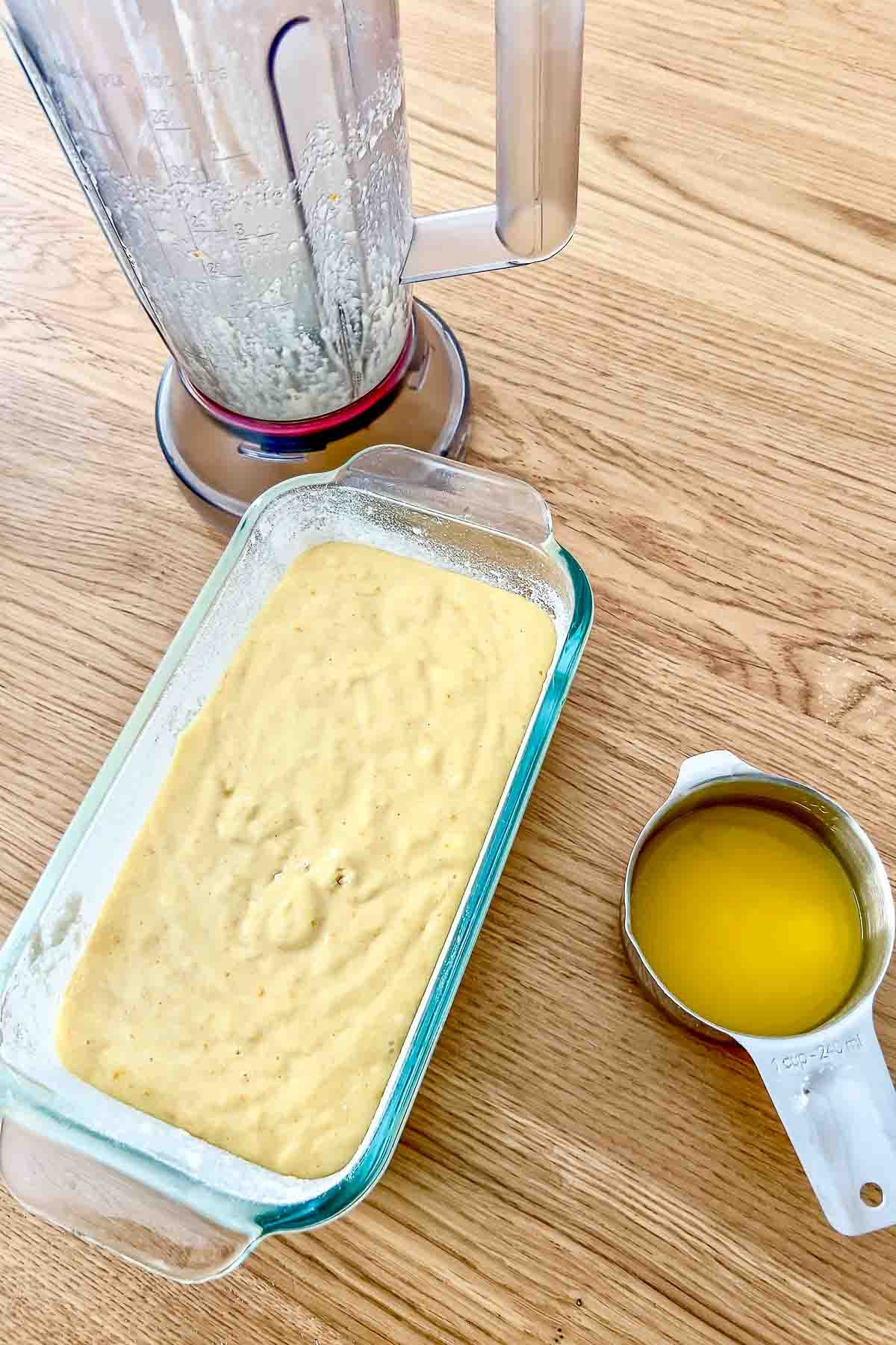 Loaf pan with batter ready for baking.