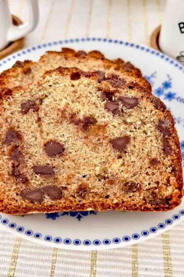 Blender Banana Bread slices on a blue and white plate.