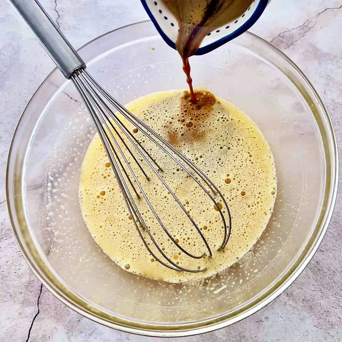 Mixed eggs sugar and vanilla with coffee.