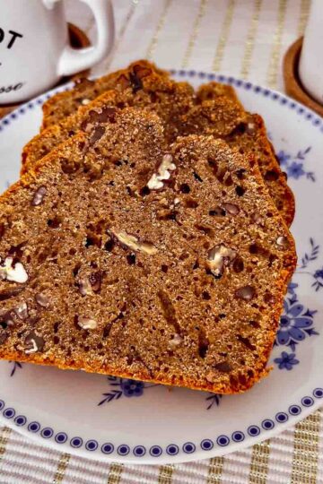 Sliced Pecan Coffee Bread on white and blue plate.