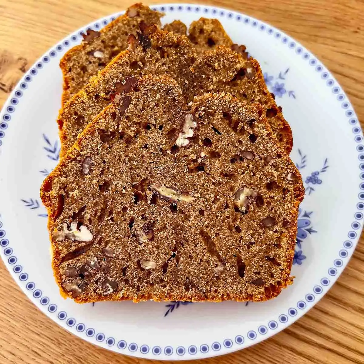 Sliced coffee bread on a blue and white plate.
