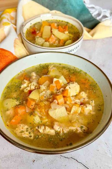Turkey Soup with Rice Made In Instant Pot and served in a bowl.