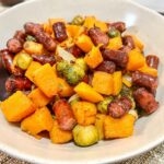 Air Fryer Sausages and Vegetables ready to serve.