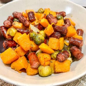 Air Fryer Sausages and Vegetables ready to serve.