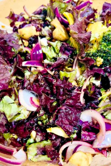 Broccoli Mushroom Salad in a glass bowl.