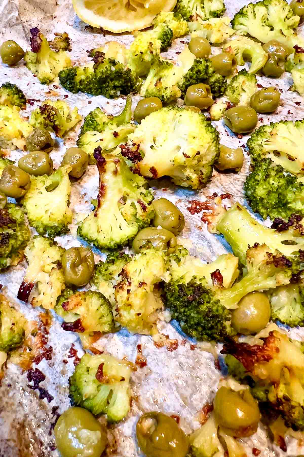Roasted broccoli and green olives.