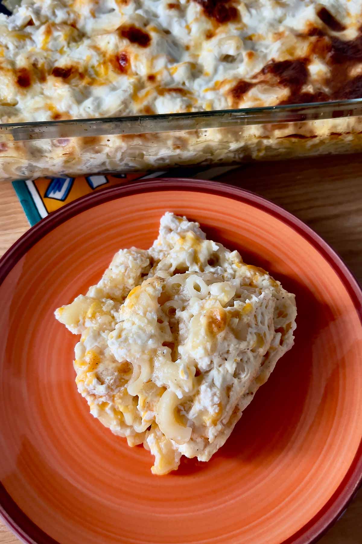 Baked mac and cheese on a serving plate.