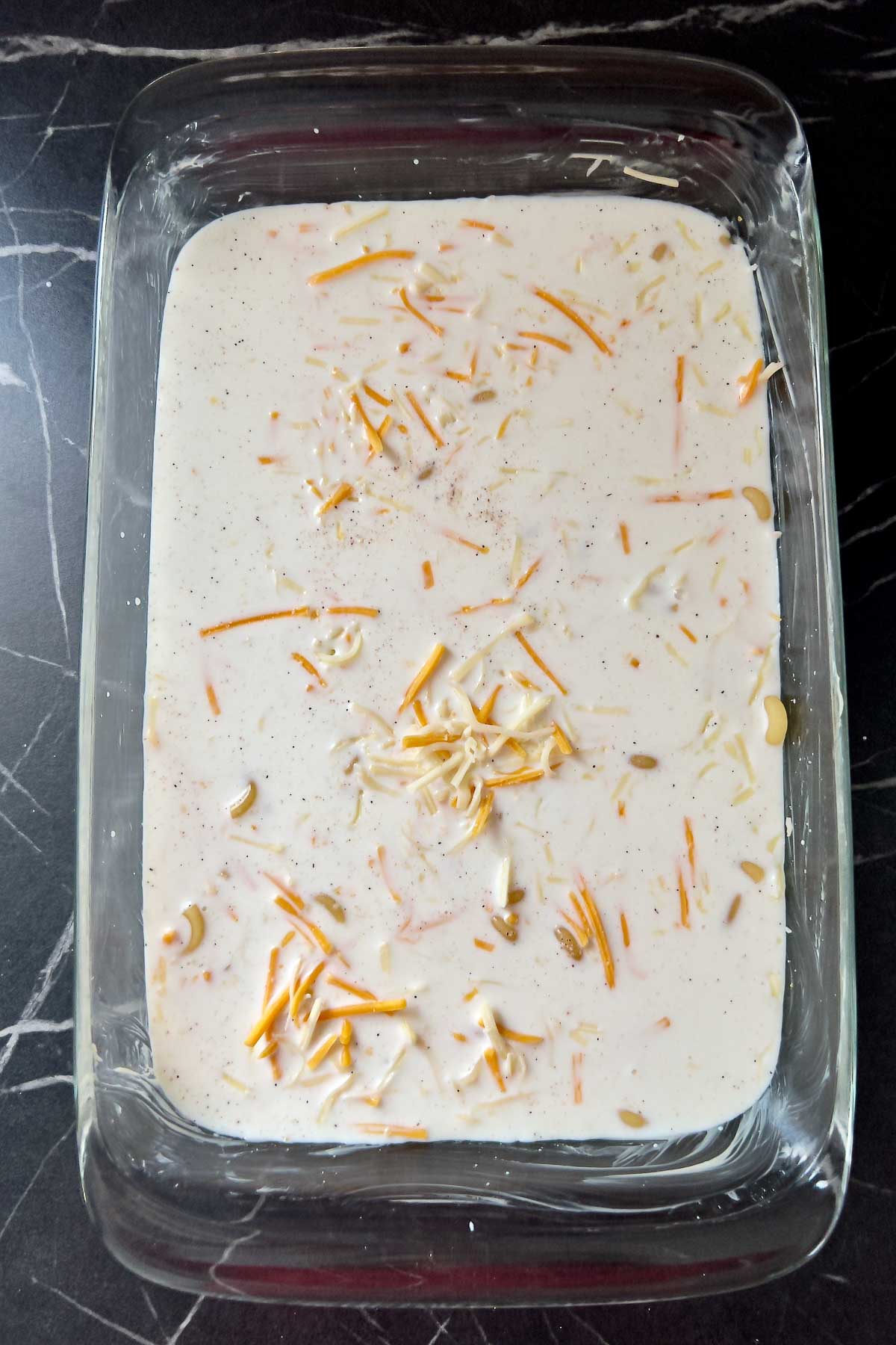 Milk added to the pasta and cheese.