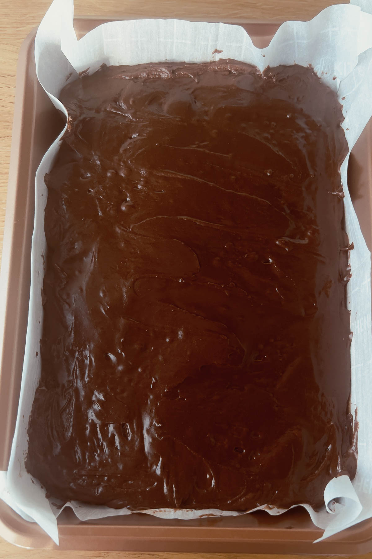 Frosted brownies in a 9x13inches pan.